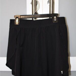 Black Athletic Skort varsity brand size medium
Luxe Flow Skirt